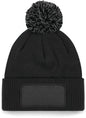 B443 - Gorro parche Snowstar® con pompón - Black / Graphite Grey - frontal