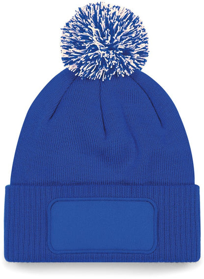 B443 - Gorro parche Snowstar® con pompón - Bright Royal / Off White - frontal